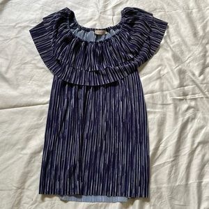 Duel ruffle off the shoulder shirt size XXL by front of closet